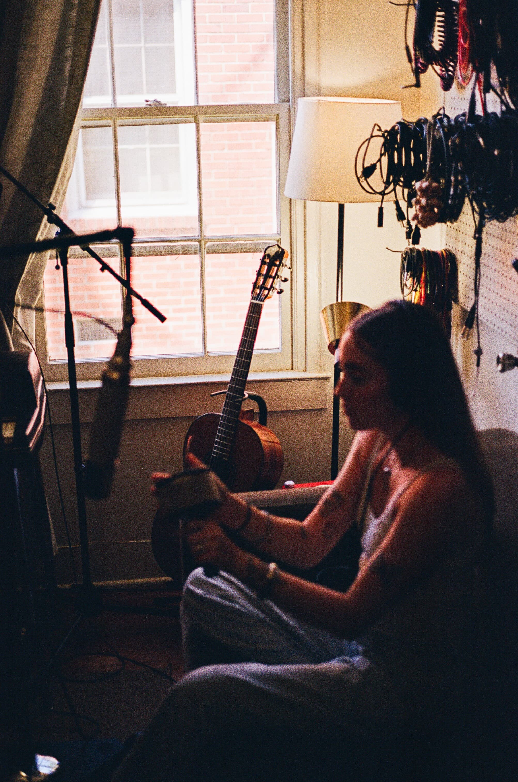 Emma Grace Burton working on a song in the studio